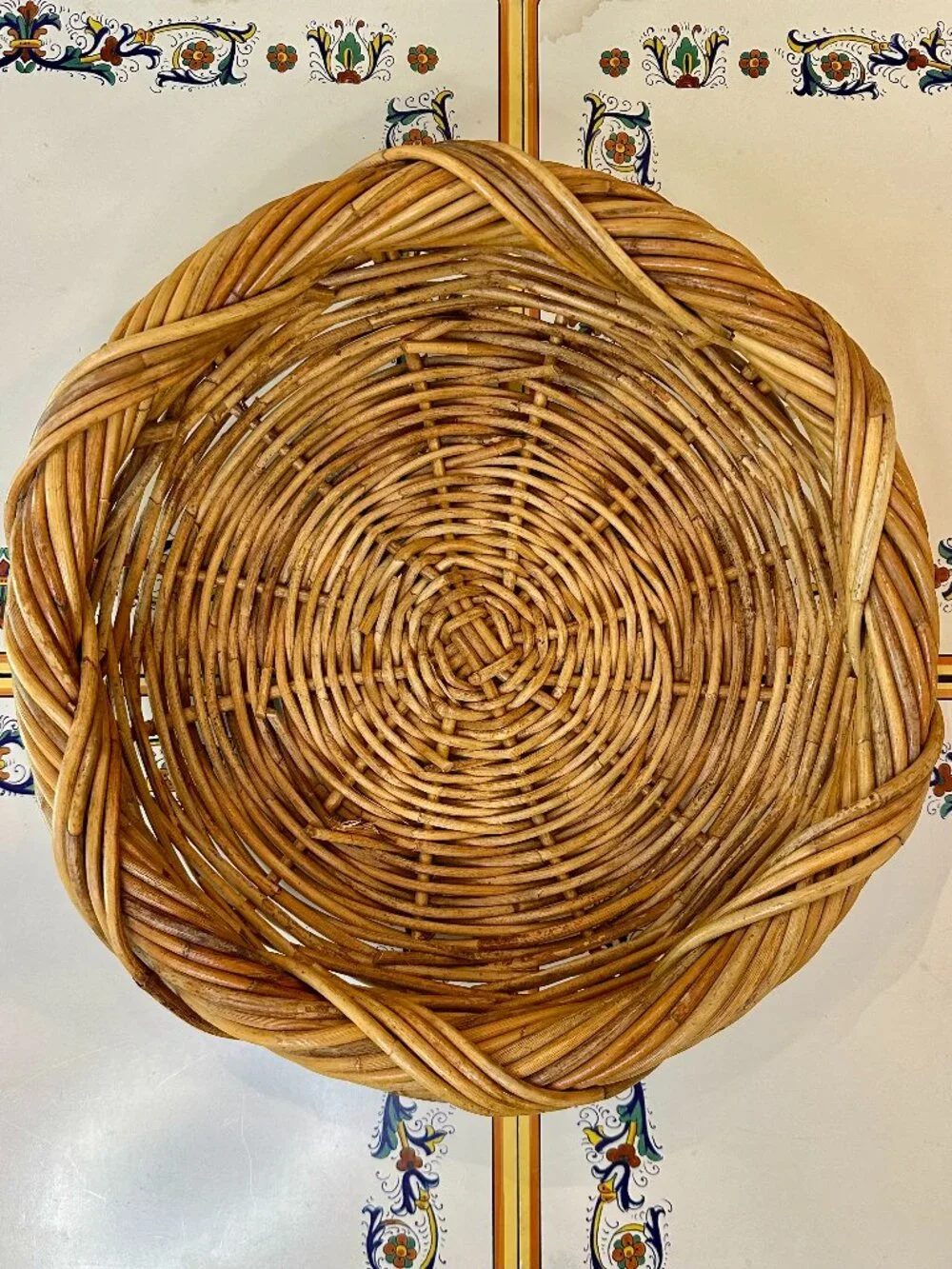 vintage round, hand-woven rattan or wicker basket
